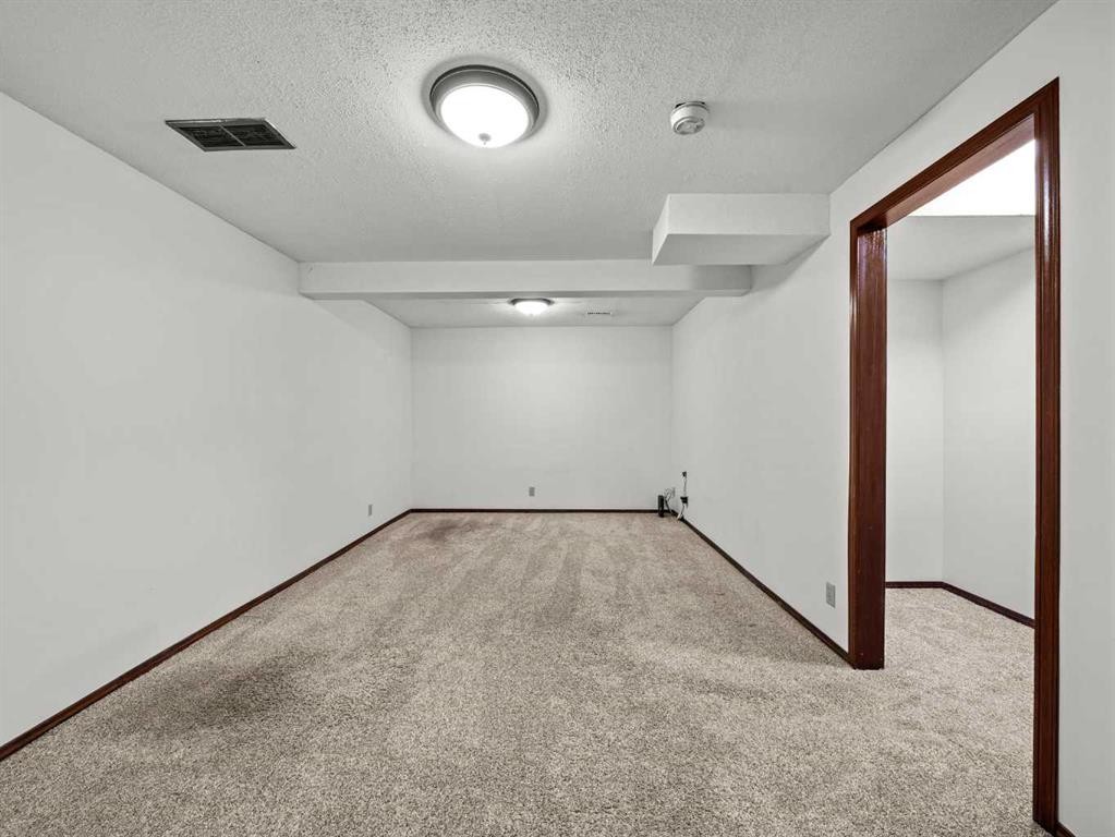 10 Martinbrook Road Ne, Calgary, AB - Indoor Photo Showing Other Room
