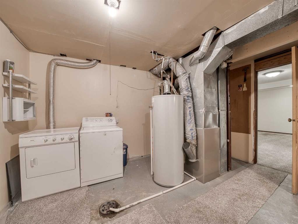 10 Martinbrook Road Ne, Calgary, AB - Indoor Photo Showing Laundry Room