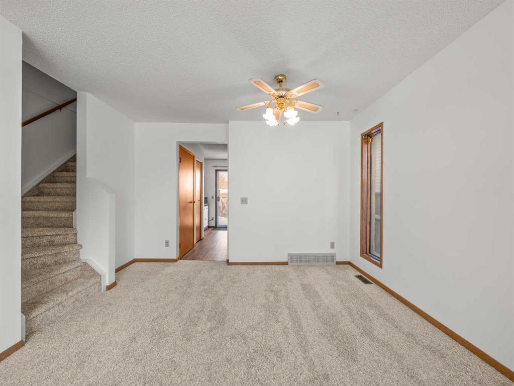 10 Martinbrook Road Ne, Calgary, AB - Indoor Photo Showing Other Room