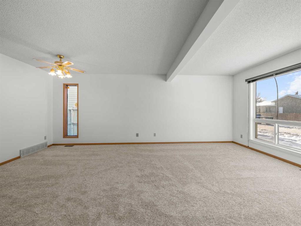 10 Martinbrook Road Ne, Calgary, AB - Indoor Photo Showing Other Room
