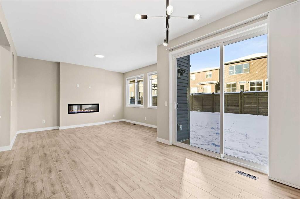 164 Wolf River Drive Se, Calgary, AB - Indoor With Fireplace
