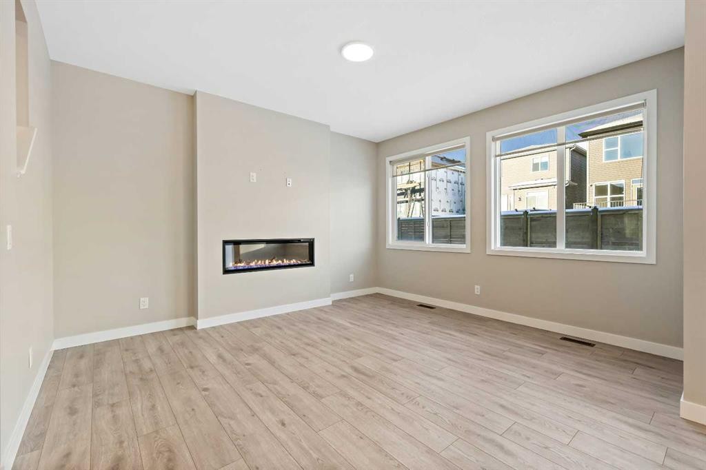 164 Wolf River Drive Se, Calgary, AB - Indoor With Fireplace