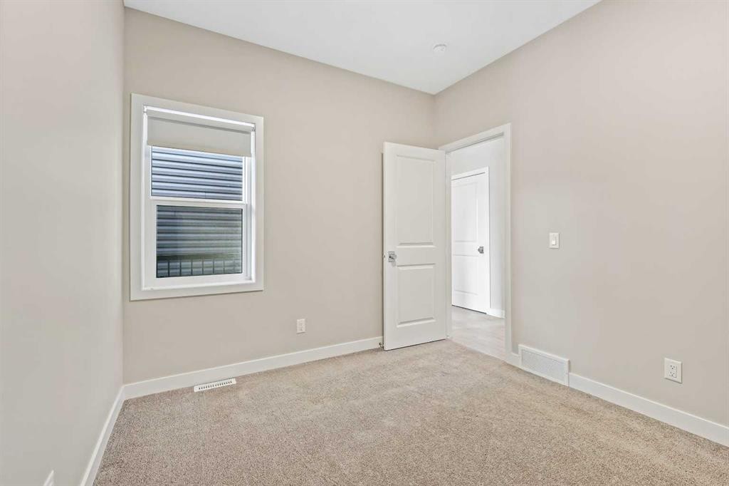 164 Wolf River Drive Se, Calgary, AB - Indoor Photo Showing Other Room