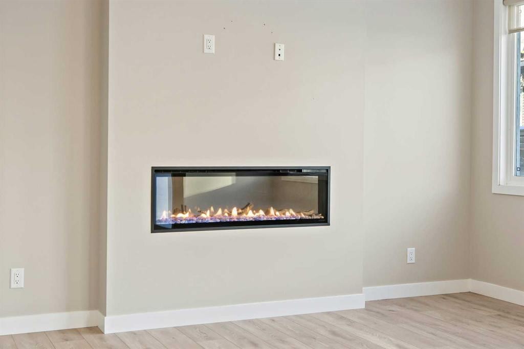 164 Wolf River Drive Se, Calgary, AB - Indoor With Fireplace