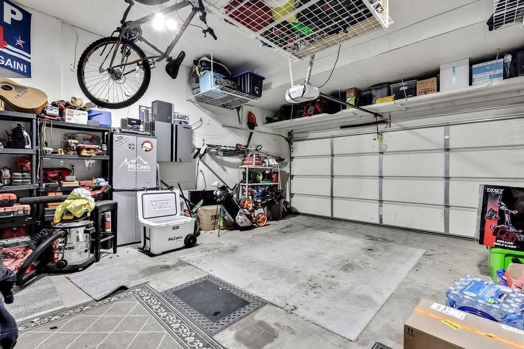 155 Cimarron Grove Circle, Okotoks, AB - Indoor Photo Showing Garage