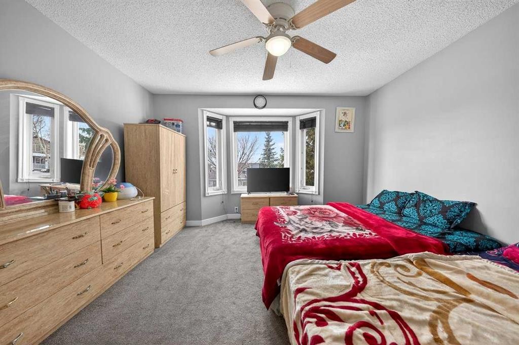 214 Martinwood Place Ne, Calgary, AB - Indoor Photo Showing Bedroom