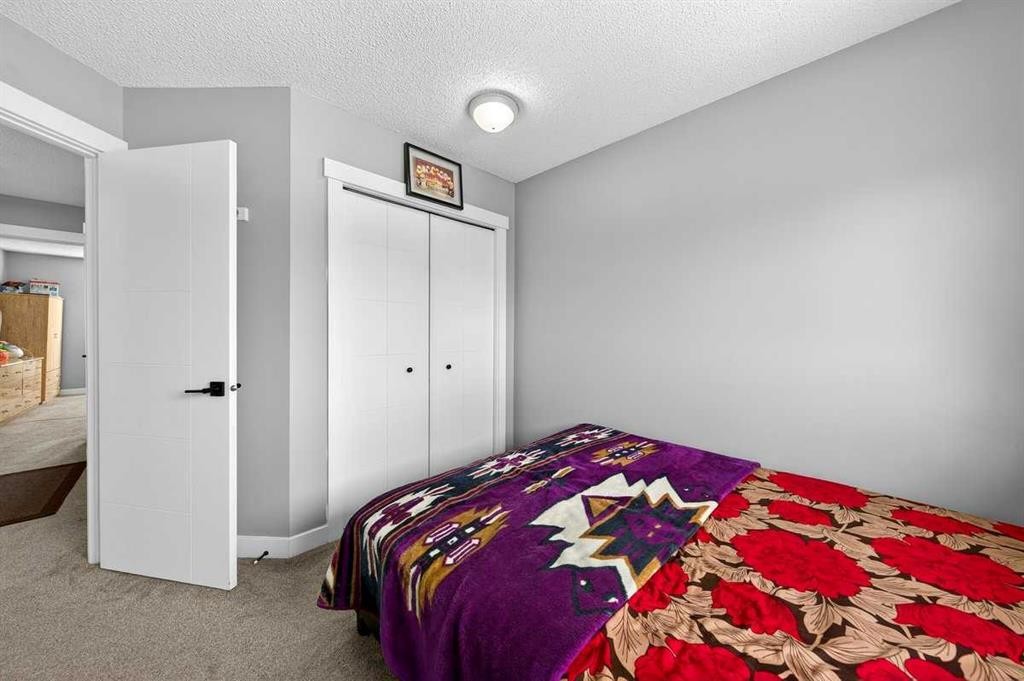 214 Martinwood Place Ne, Calgary, AB - Indoor Photo Showing Bedroom