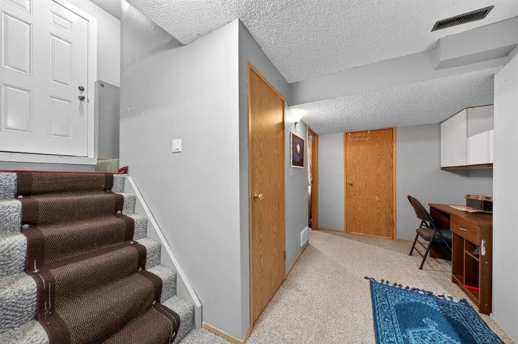 214 Martinwood Place Ne, Calgary, AB - Indoor Photo Showing Other Room