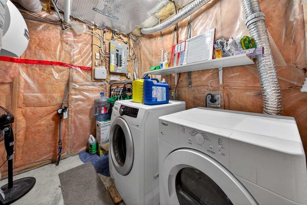 214 Martinwood Place Ne, Calgary, AB - Indoor Photo Showing Laundry Room