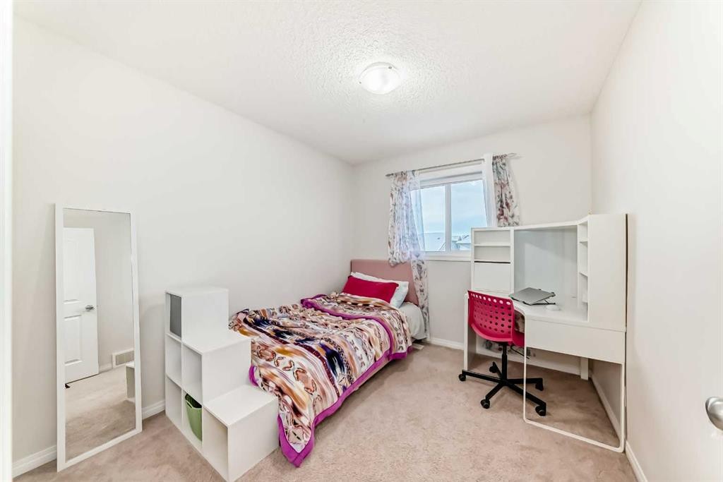 185 Legacy Crescent Se, Calgary, AB - Indoor Photo Showing Bedroom