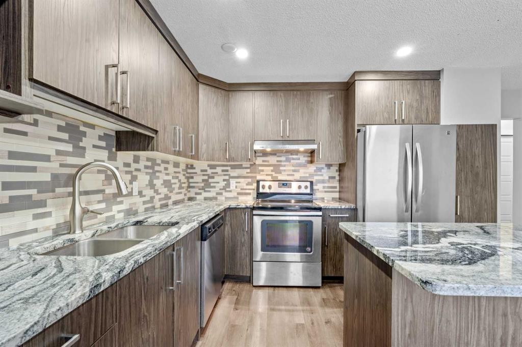 263 Doverview Crescent Se, Calgary, AB - Indoor Photo Showing Kitchen With Double Sink With Upgraded Kitchen