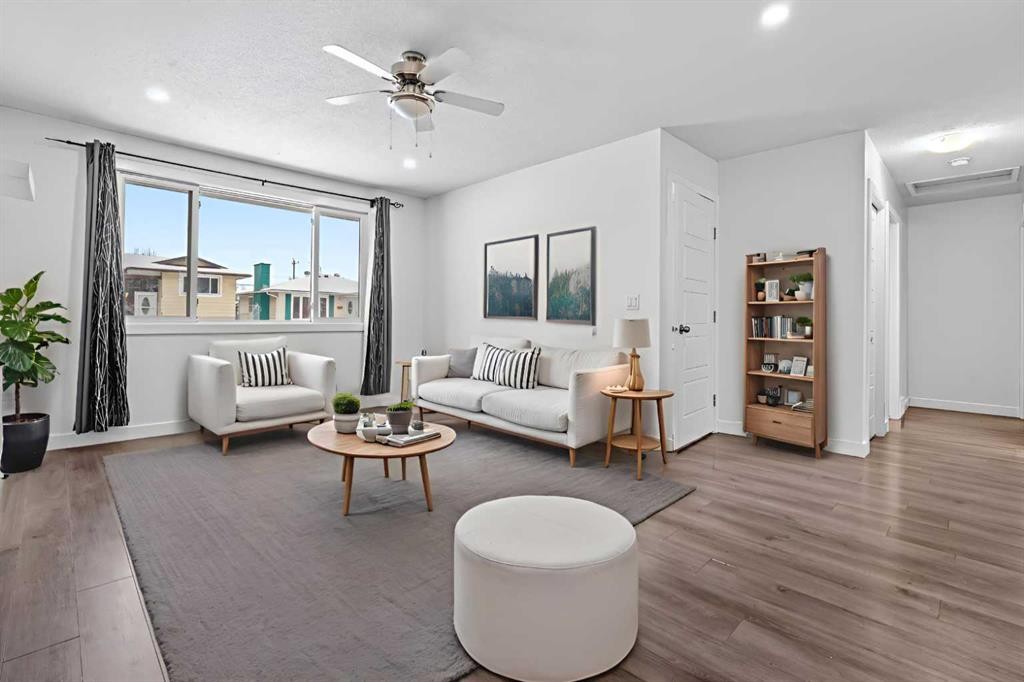 263 Doverview Crescent Se, Calgary, AB - Indoor Photo Showing Living Room