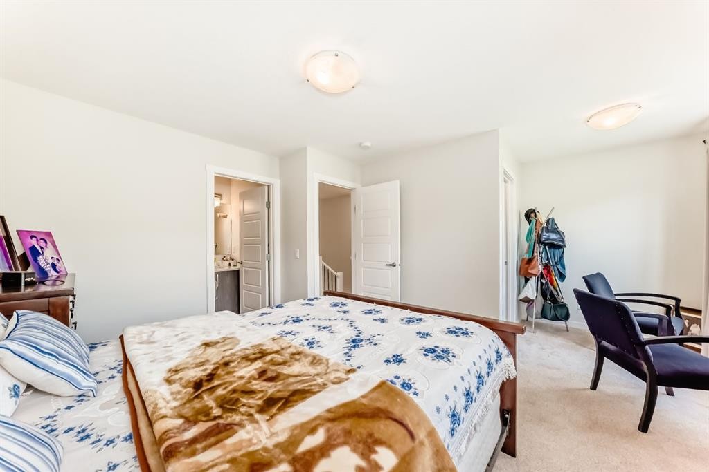 206 Cranbrook Square Se, Calgary, AB - Indoor Photo Showing Bedroom