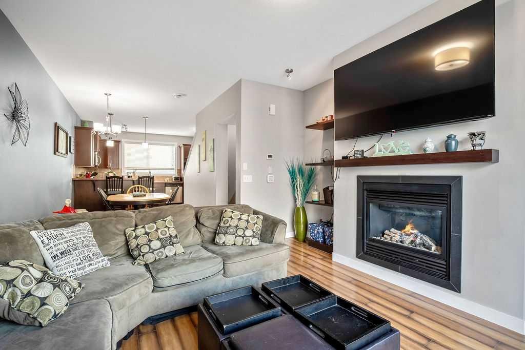 114 Skyview Ranch Gardens Ne, Calgary, AB - Indoor Photo Showing Living Room With Fireplace
