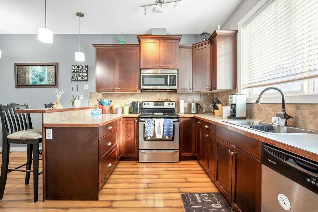 114 Skyview Ranch Gardens Ne, Calgary, AB - Indoor Photo Showing Kitchen With Double Sink