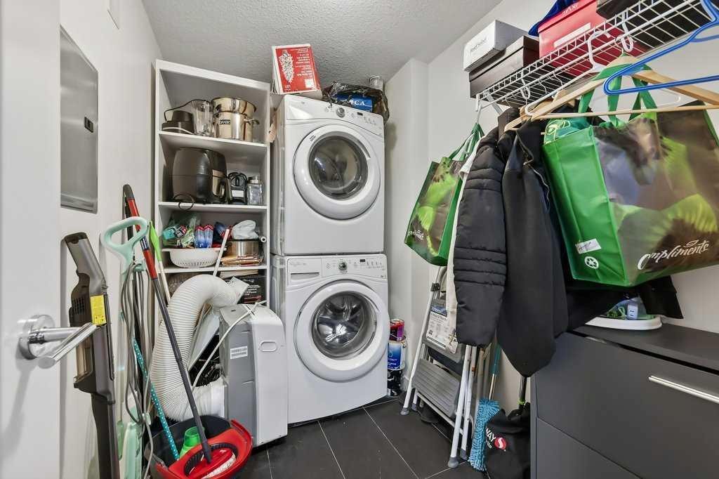 201-25 Aspenmont Heights Sw, Calgary, AB - Indoor Photo Showing Laundry Room