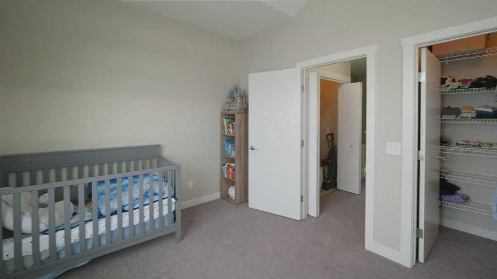 154 Redstone View Ne, Calgary, AB - Indoor Photo Showing Bedroom