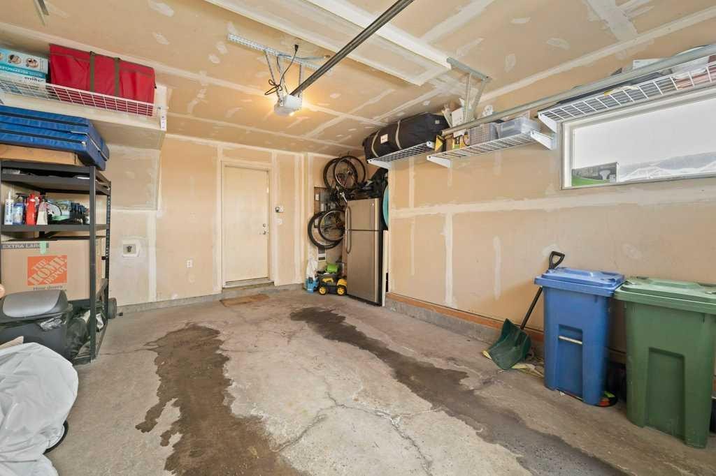154 Redstone View Ne, Calgary, AB - Indoor Photo Showing Garage