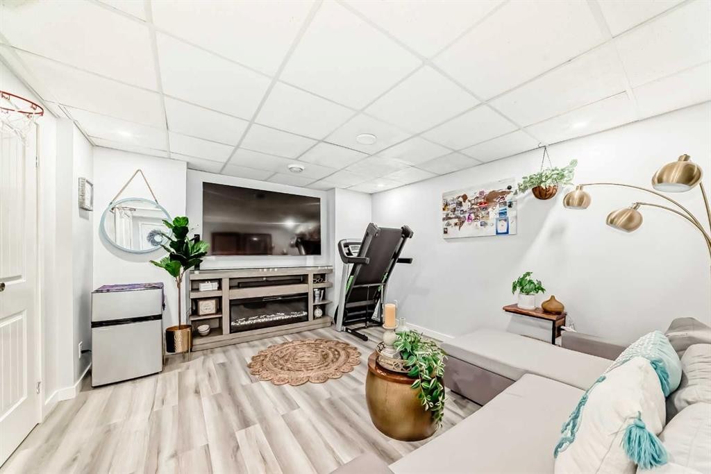 35 Nolanlake Cove Nw, Calgary, AB - Indoor With Fireplace