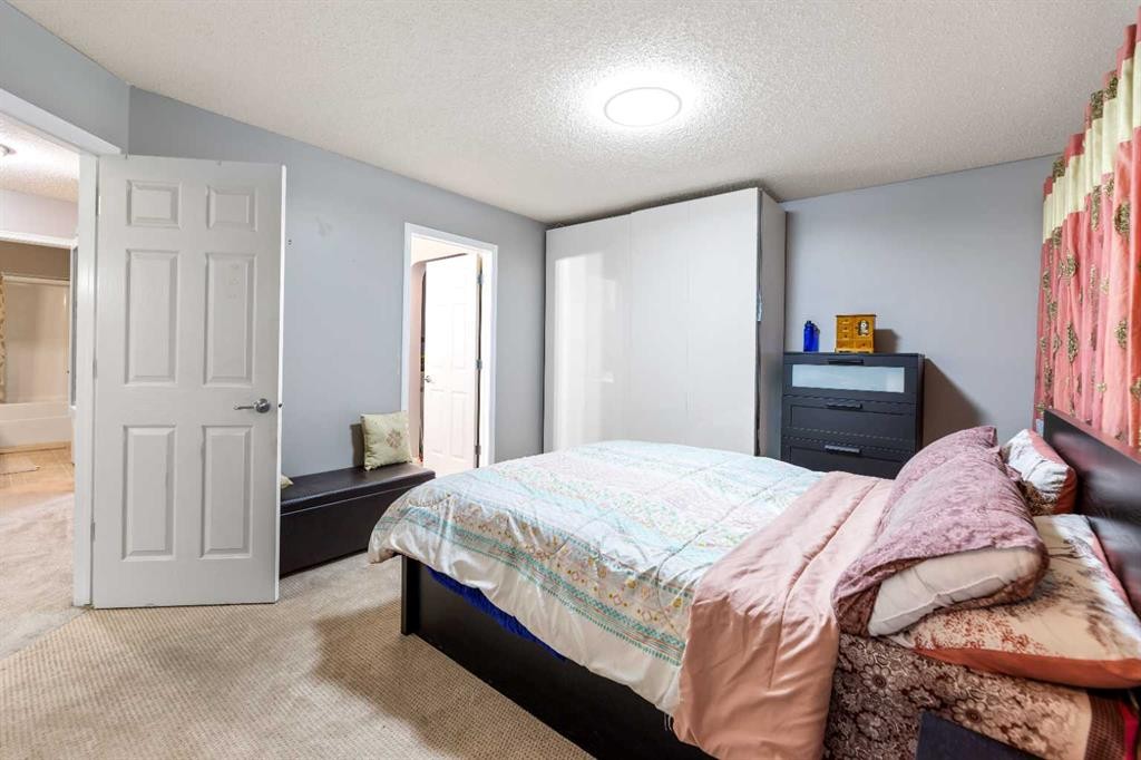 57 Saddlemead Road Ne, Calgary, AB - Indoor Photo Showing Bedroom