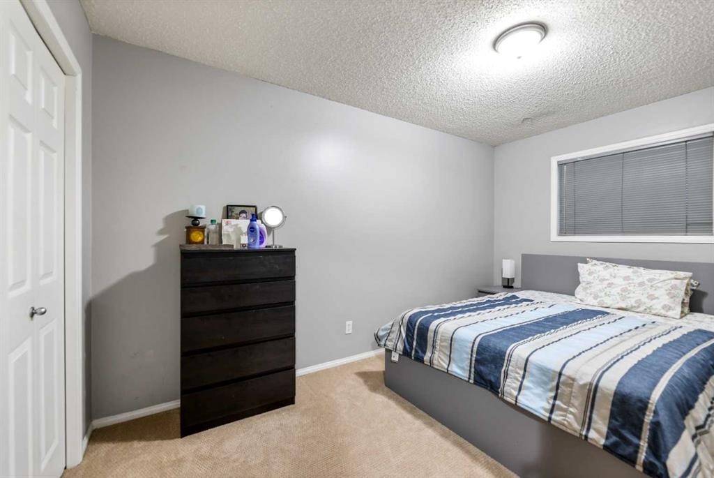 57 Saddlemead Road Ne, Calgary, AB - Indoor Photo Showing Bedroom