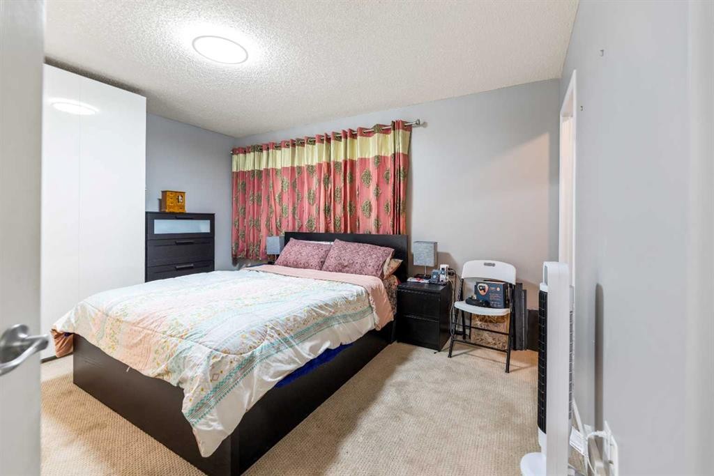57 Saddlemead Road Ne, Calgary, AB - Indoor Photo Showing Bedroom
