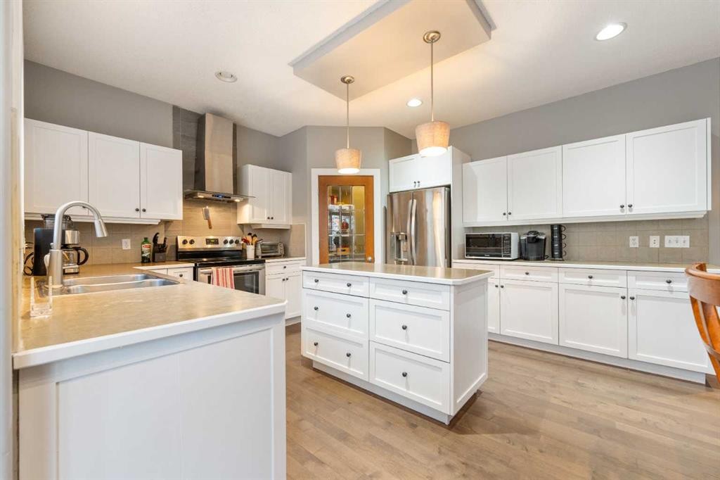4 Crestridge Way Sw, Calgary, AB - Indoor Photo Showing Kitchen With Stainless Steel Kitchen With Double Sink