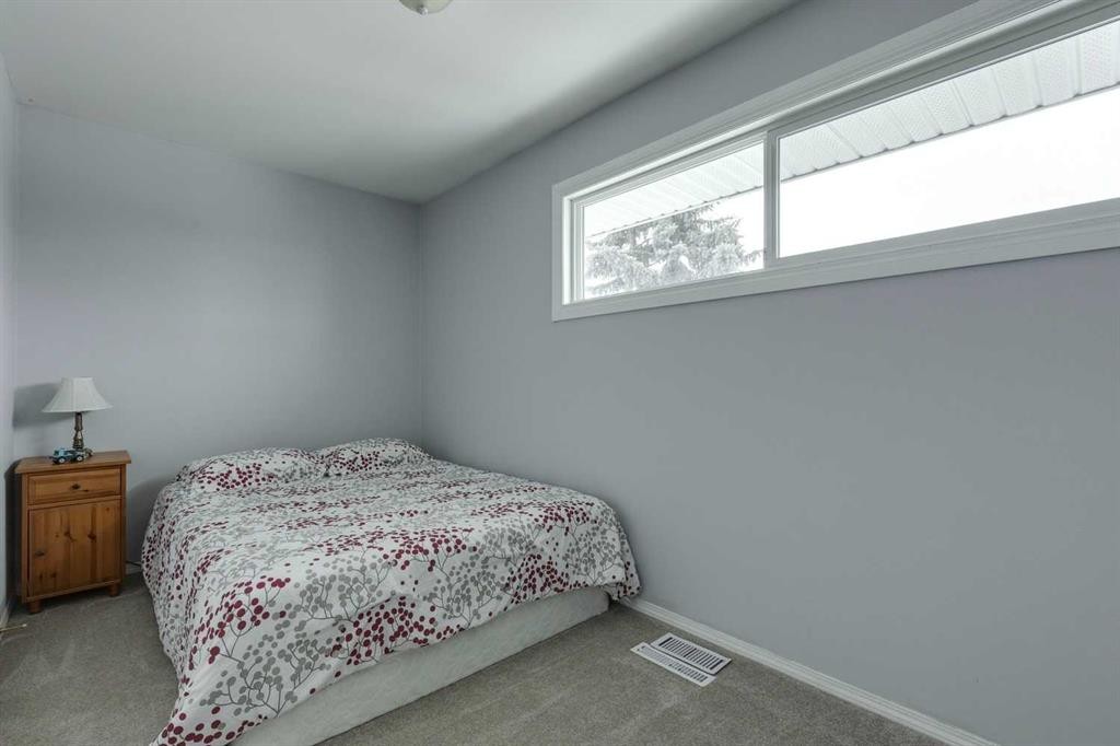 681 Regal Park Ne, Calgary, AB - Indoor Photo Showing Bedroom