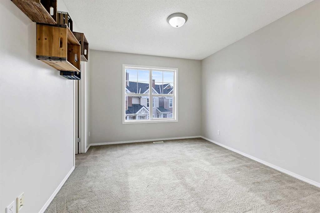 64 Elgin Gardens Se, Calgary, AB - Indoor Photo Showing Other Room