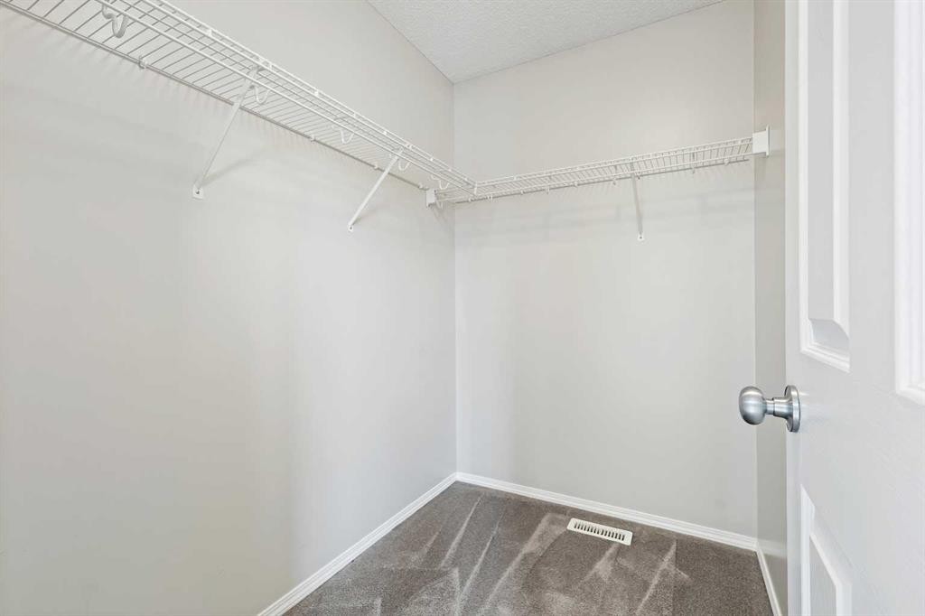 64 Elgin Gardens Se, Calgary, AB - Indoor With Storage