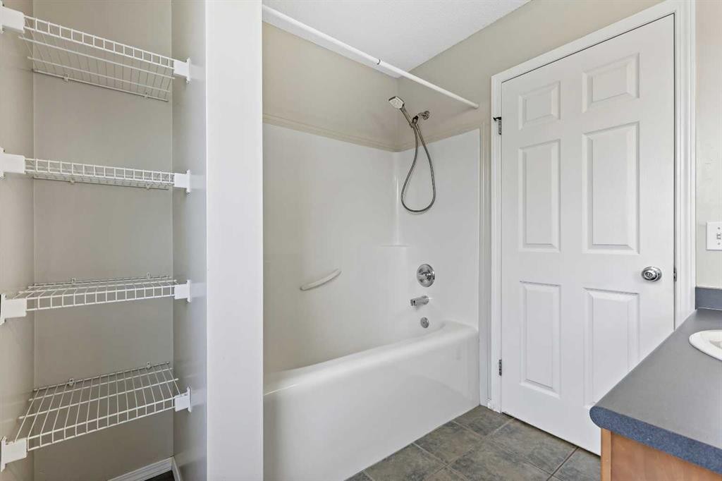 64 Elgin Gardens Se, Calgary, AB - Indoor With Storage