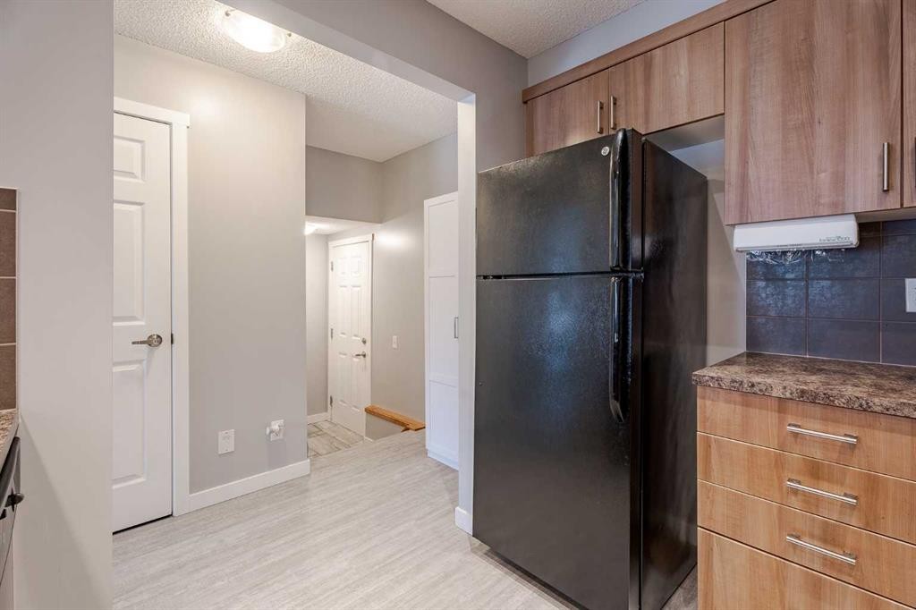 3098 Windsong Boulevard Sw, Airdrie, AB - Indoor Photo Showing Other Room