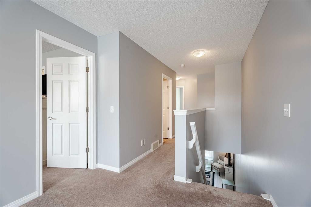 3098 Windsong Boulevard Sw, Airdrie, AB - Indoor Photo Showing Other Room