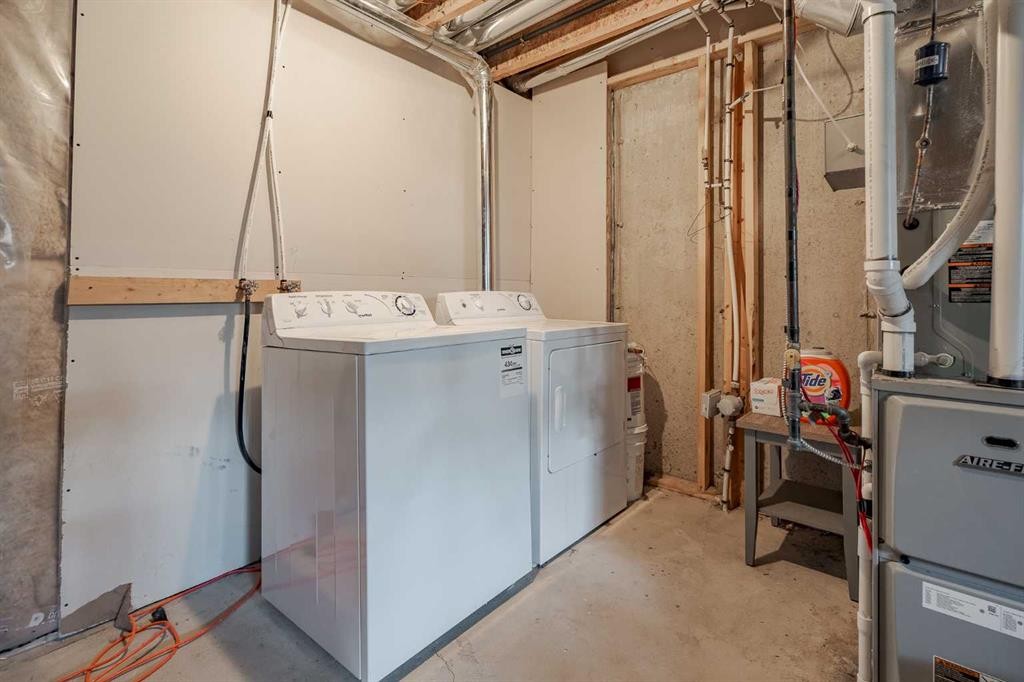 3098 Windsong Boulevard Sw, Airdrie, AB - Indoor Photo Showing Laundry Room