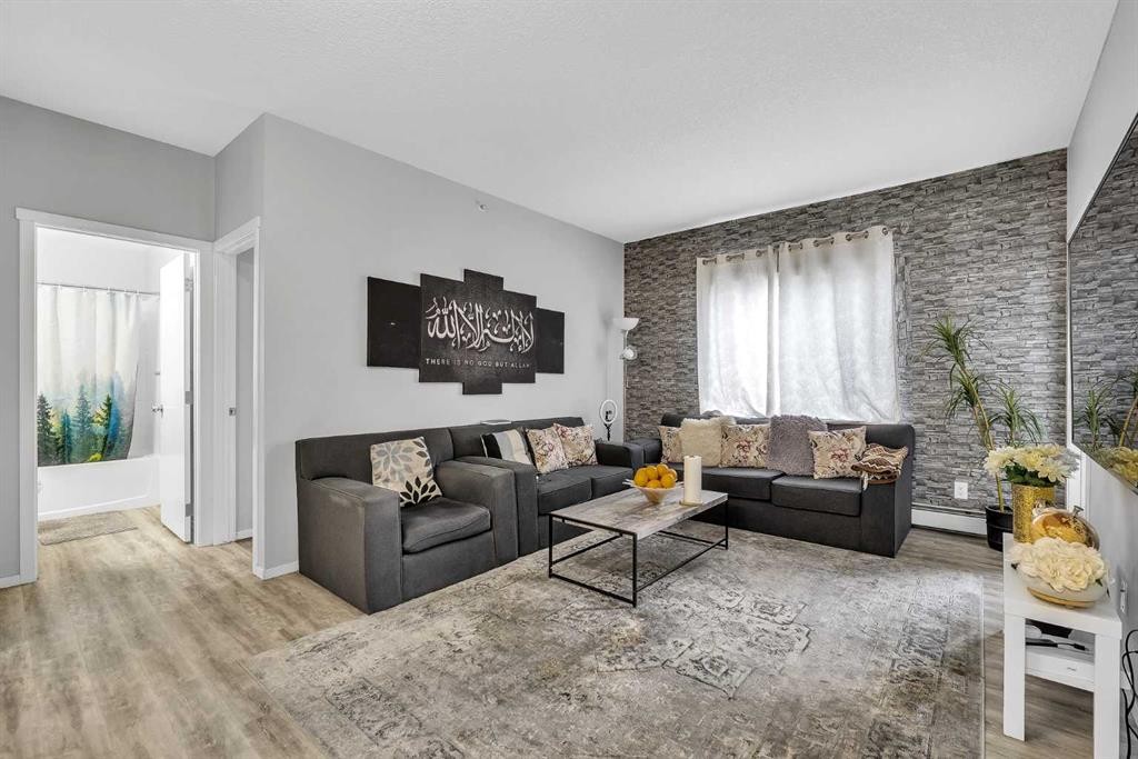 1613-4641 128 Avenue Ne, Calgary, AB - Indoor Photo Showing Living Room