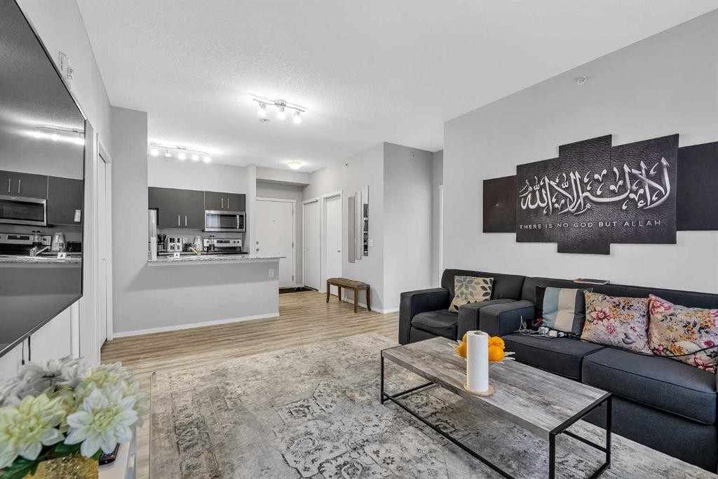 1613-4641 128 Avenue Ne, Calgary, AB - Indoor Photo Showing Living Room