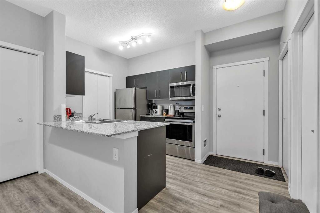 1613-4641 128 Avenue Ne, Calgary, AB - Indoor Photo Showing Kitchen