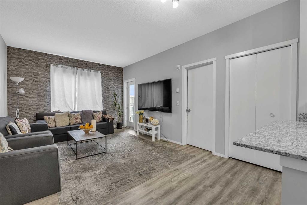1613-4641 128 Avenue Ne, Calgary, AB - Indoor Photo Showing Living Room