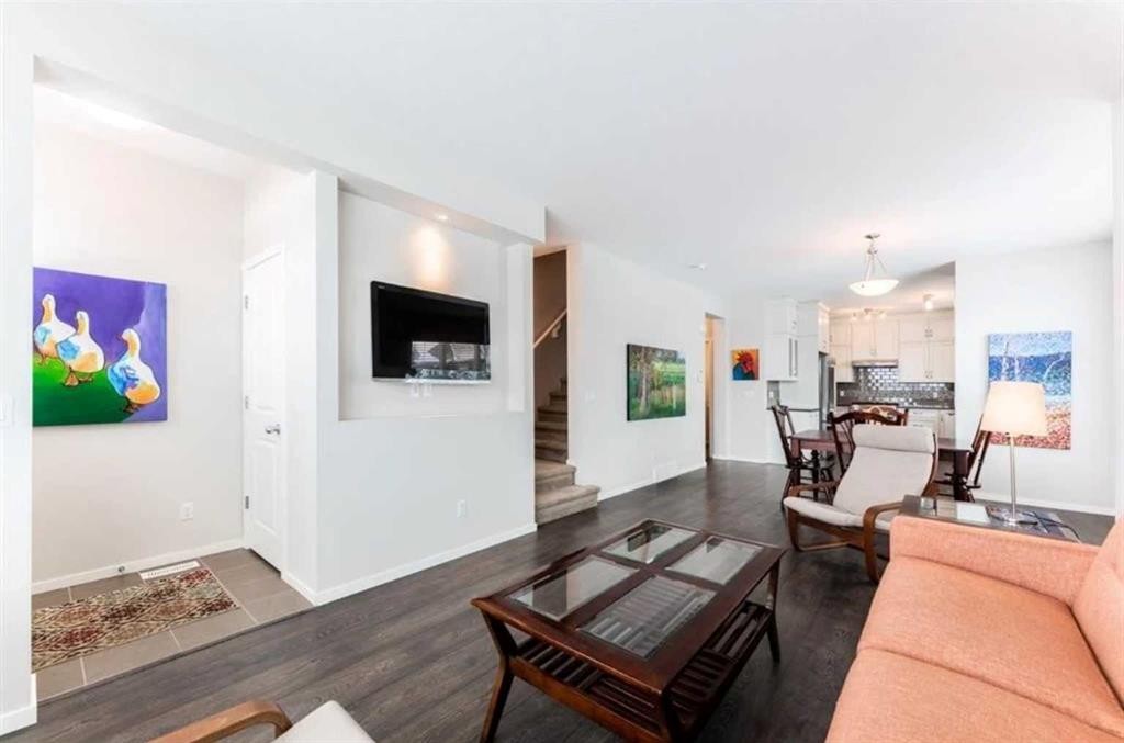 12 Legacy Main Street Se, Calgary, AB - Indoor Photo Showing Living Room