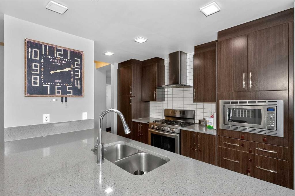 45 Redstone Drive Ne, Calgary, AB - Indoor Photo Showing Kitchen With Double Sink