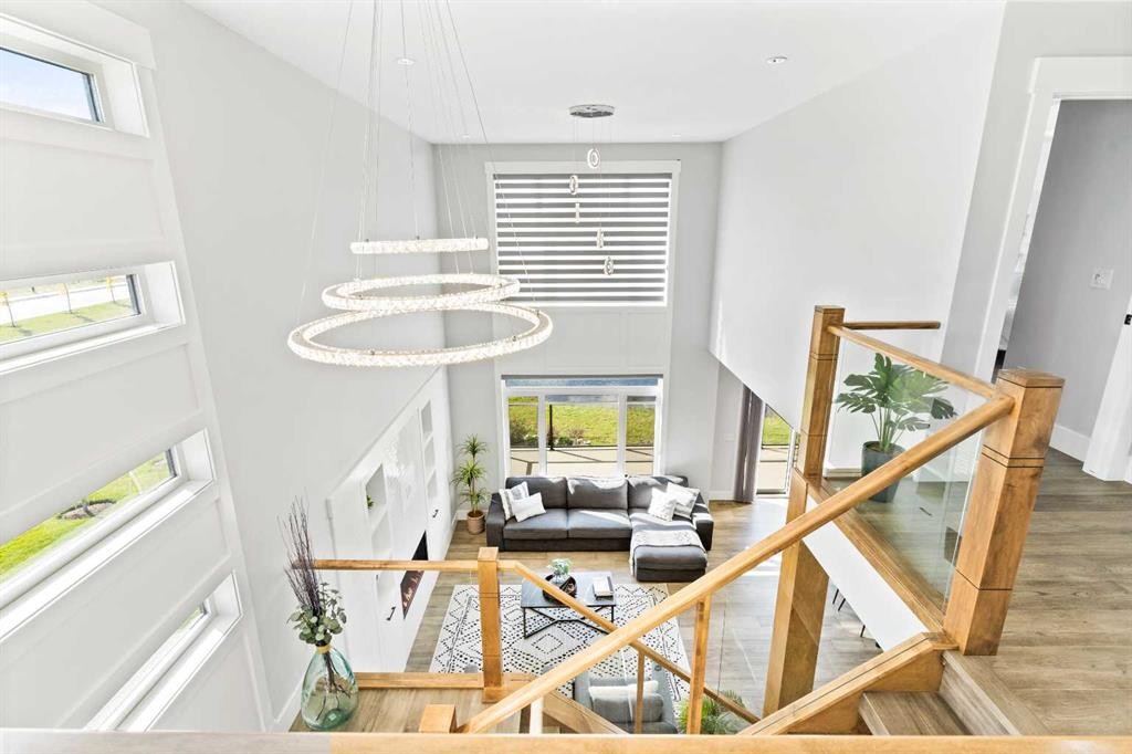 61 Sunvalley View, Cochrane, AB - Indoor Photo Showing Other Room