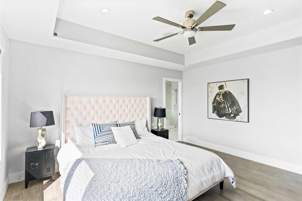 61 Sunvalley View, Cochrane, AB - Indoor Photo Showing Bedroom