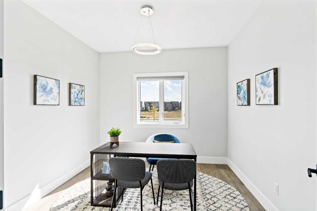 61 Sunvalley View, Cochrane, AB - Indoor Photo Showing Dining Room