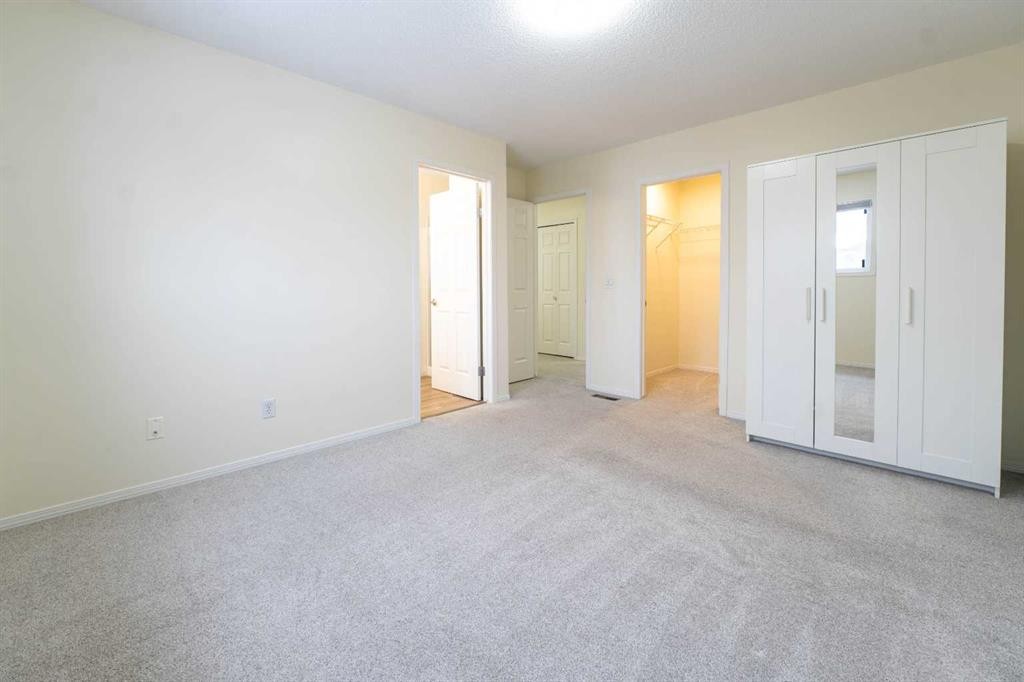 204-760 Railway Gate Sw, Airdrie, AB - Indoor Photo Showing Other Room