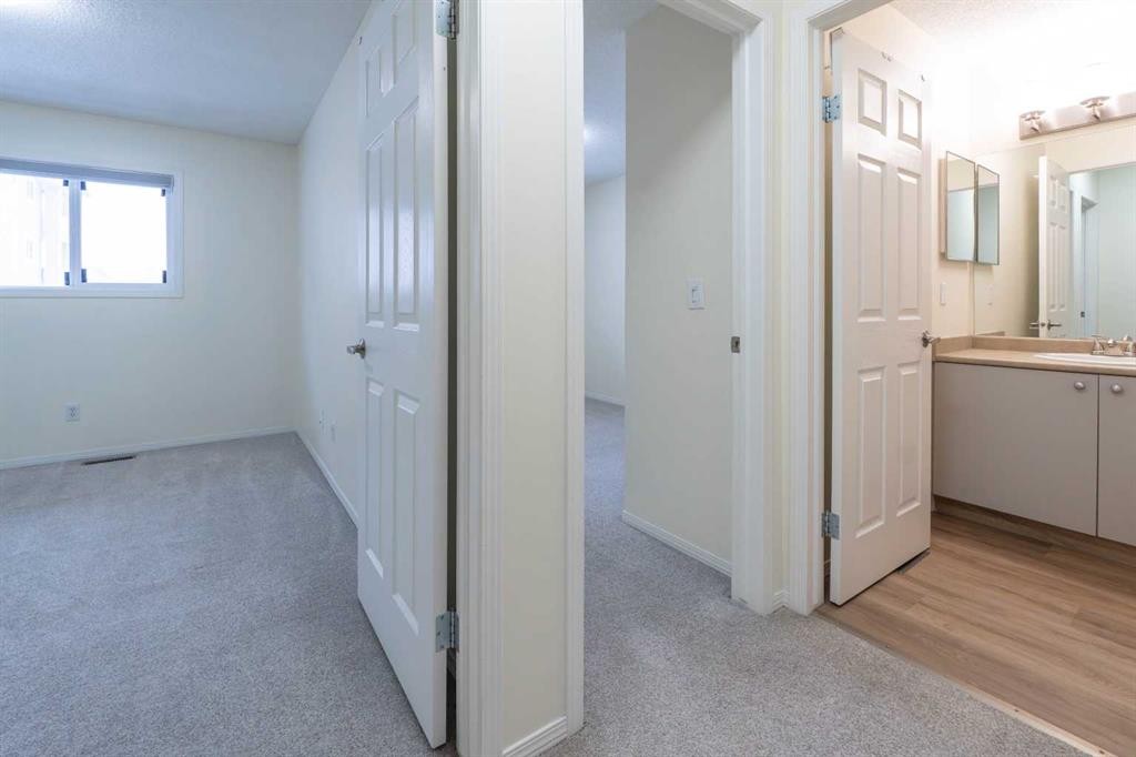 204-760 Railway Gate Sw, Airdrie, AB - Indoor Photo Showing Other Room