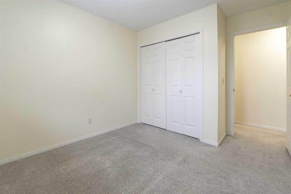 204-760 Railway Gate Sw, Airdrie, AB - Indoor Photo Showing Other Room
