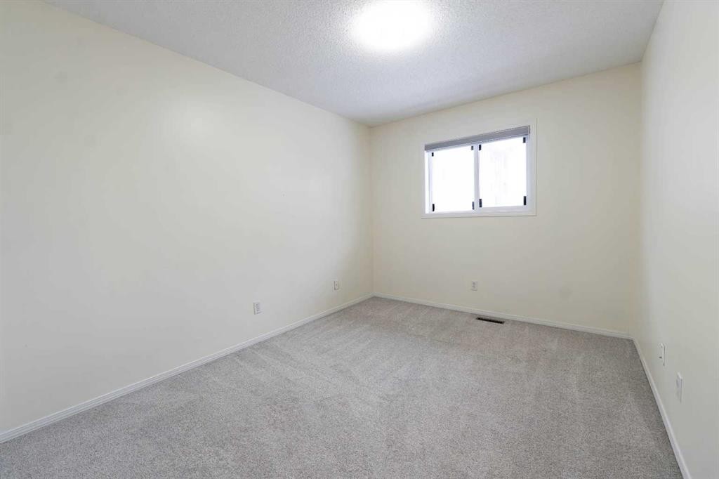 204-760 Railway Gate Sw, Airdrie, AB - Indoor Photo Showing Other Room