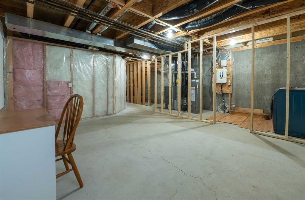 204-760 Railway Gate Sw, Airdrie, AB - Indoor Photo Showing Basement