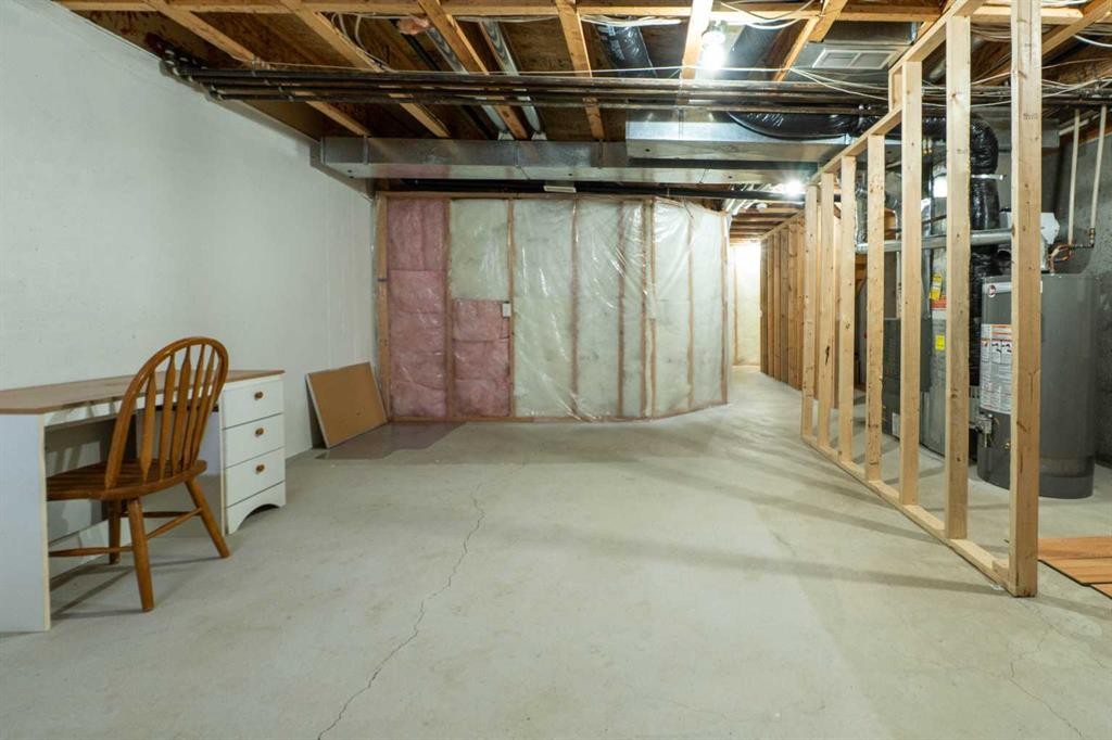 204-760 Railway Gate Sw, Airdrie, AB - Indoor Photo Showing Basement