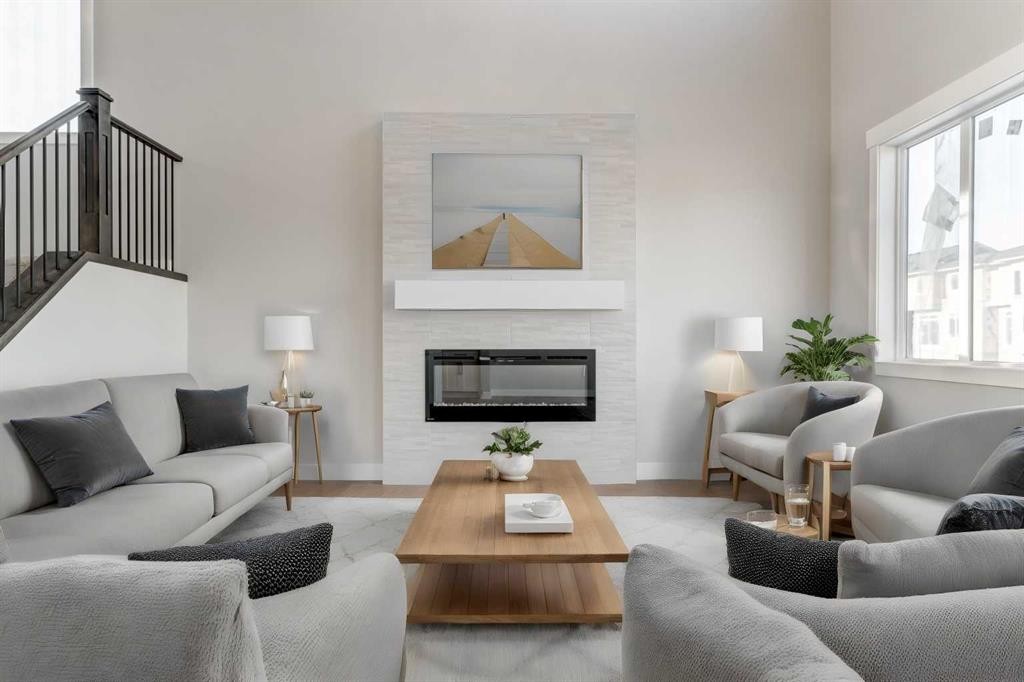 157 Vantage Drive, Cochrane, AB - Indoor Photo Showing Living Room With Fireplace
